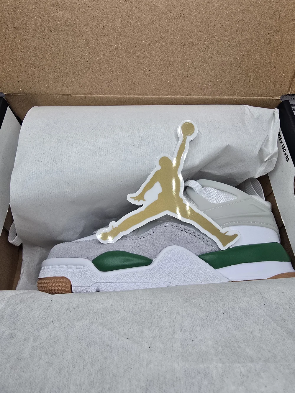 Jordan 4 RM Kids' White and Gray Athletic Sneakers with Green Accents